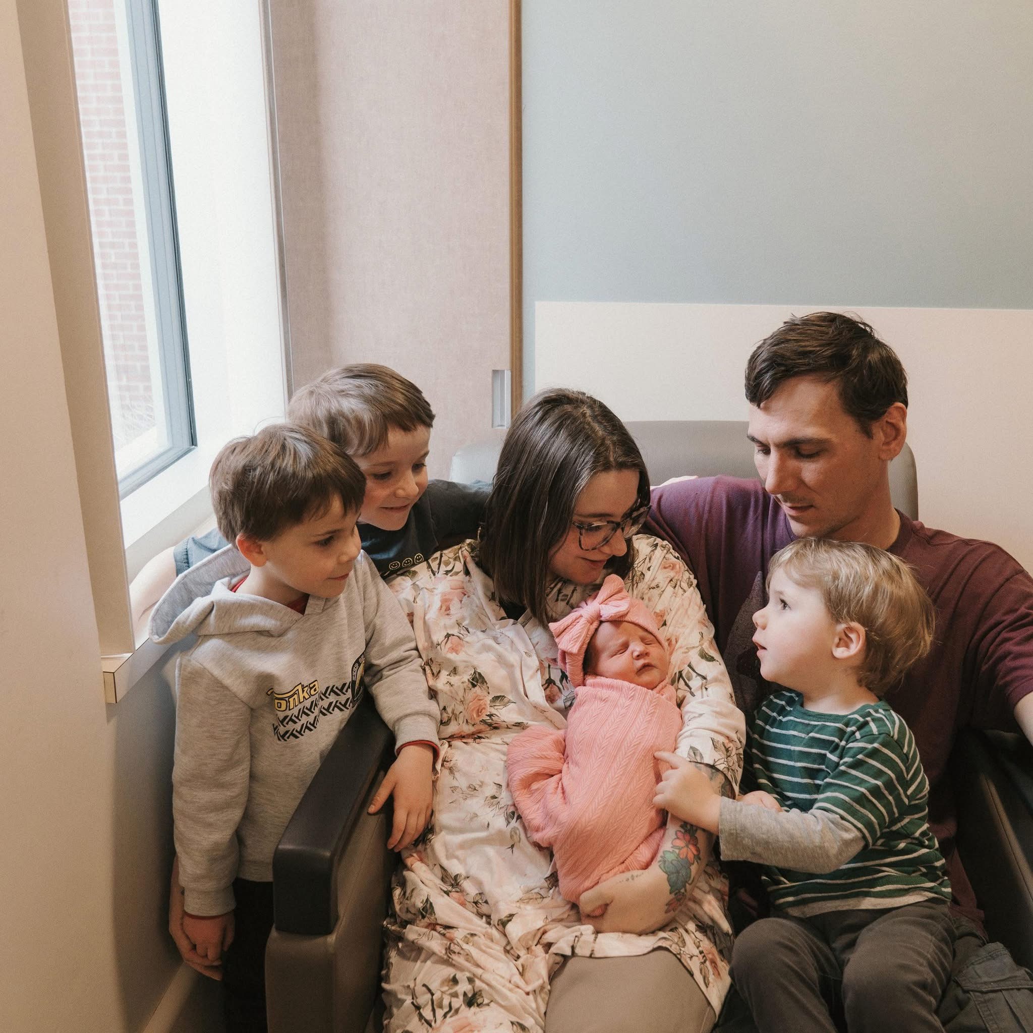 Family sharing a quiet, supportive moment together